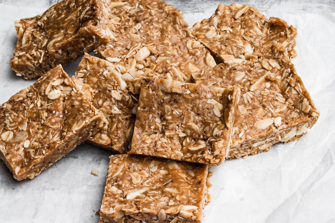granola bars stacked on top of each other on a grey background