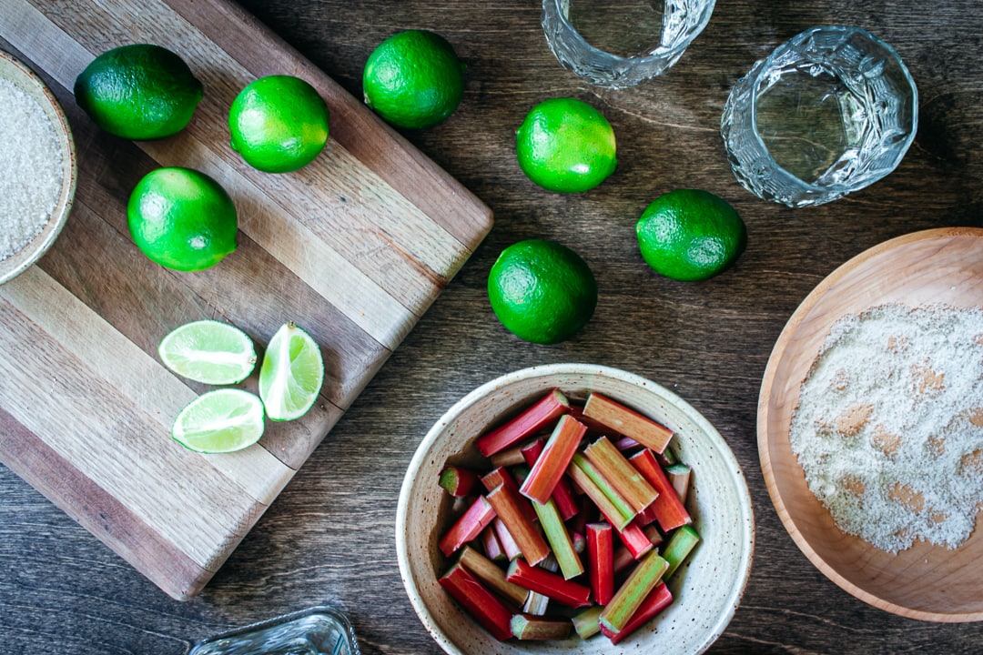 ingredients for cocktail in bowls and on a cutting board