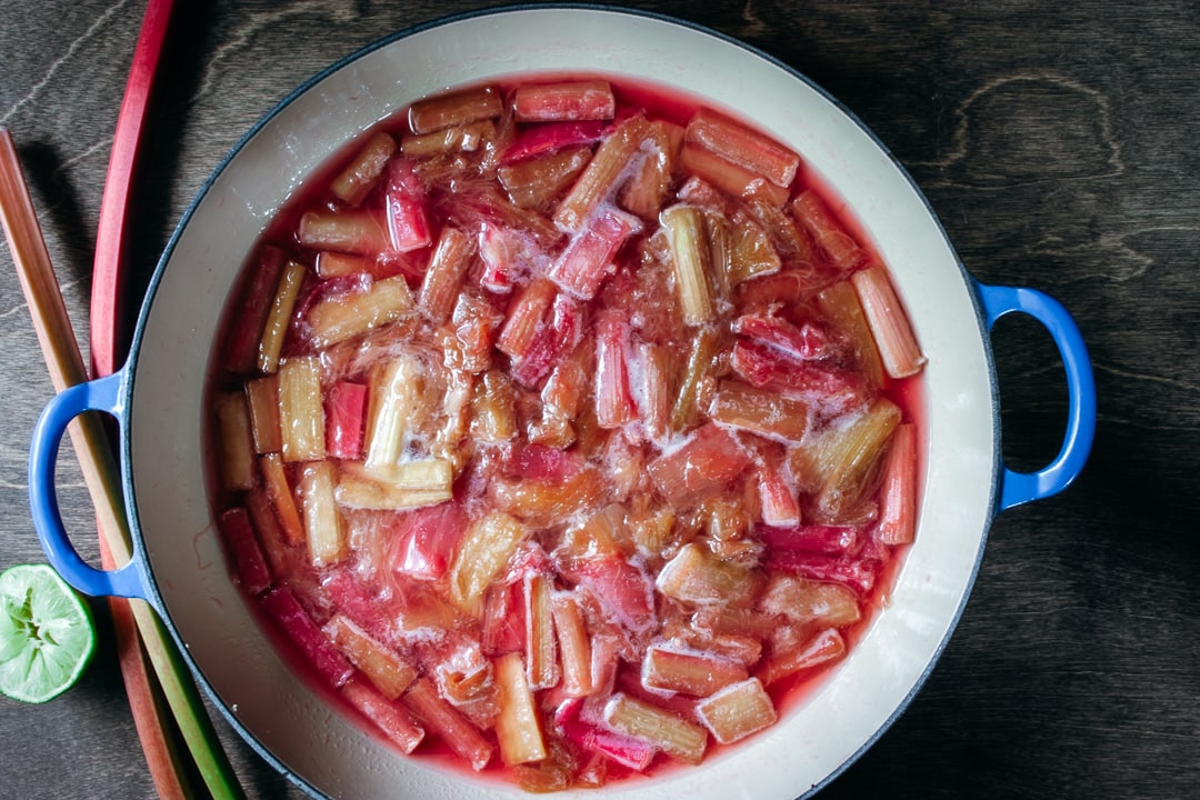 cooked rhubarb syrup in a saucepan