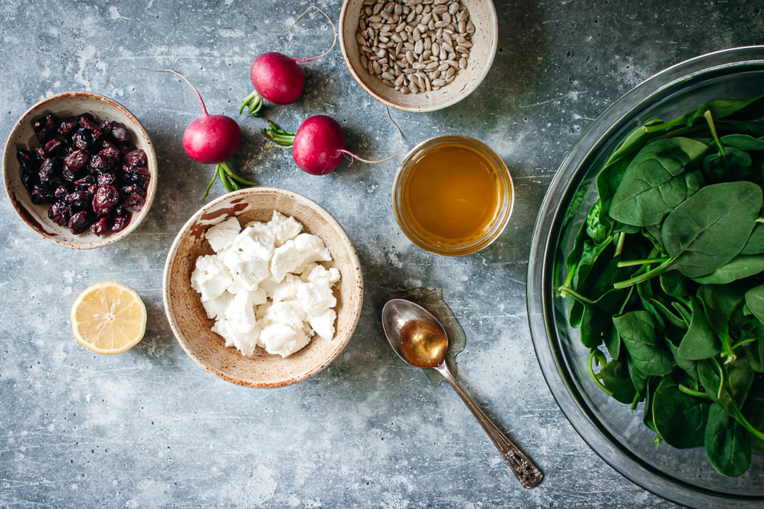 ingredients for recipe in different size bowls on a blue-gray background