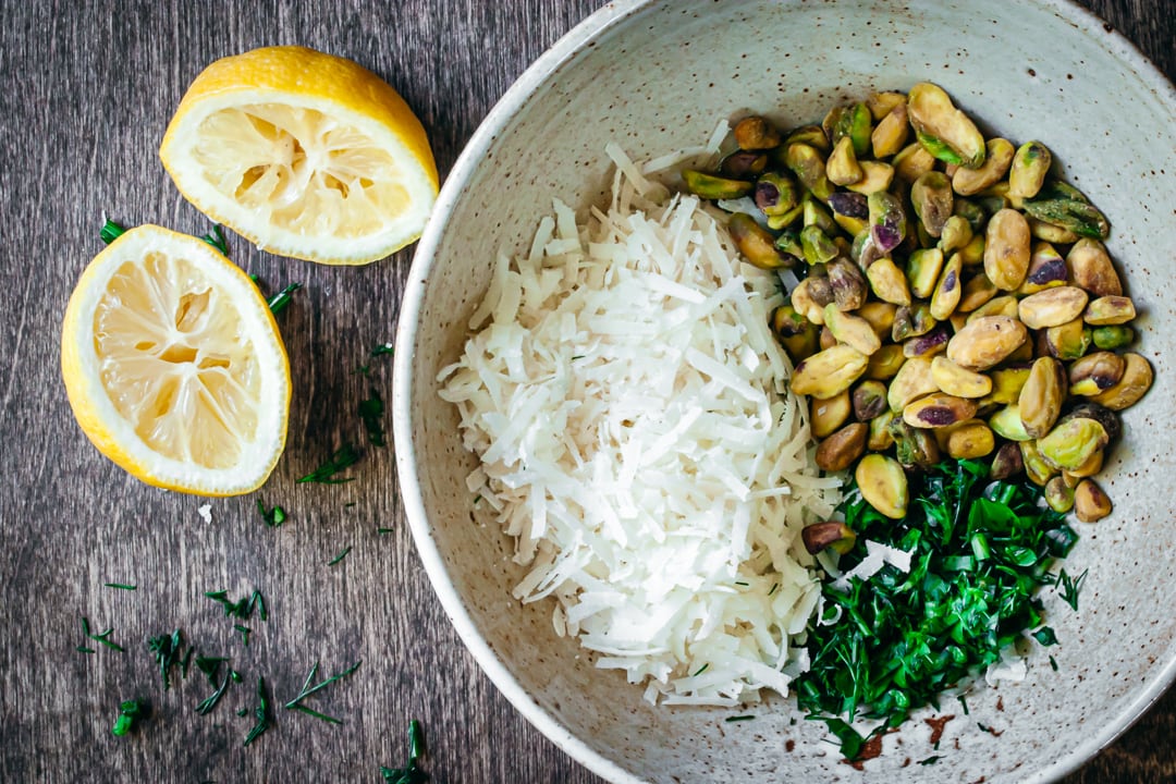 pistachios, cheeses, and herbs in a bowl