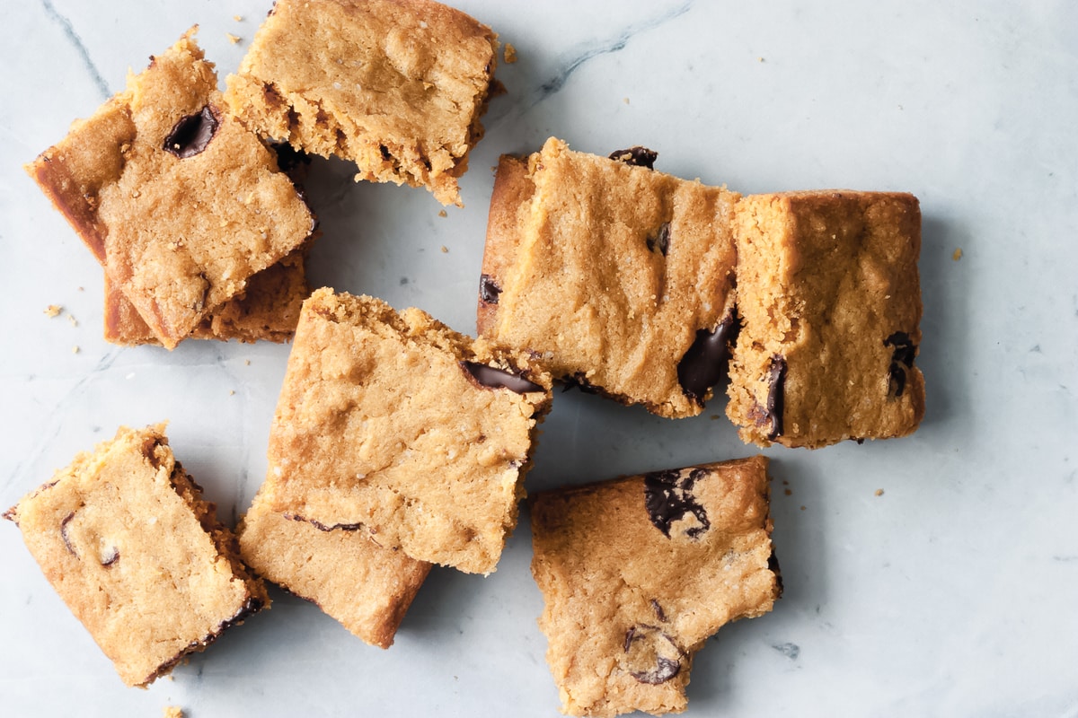 chocolate chip cookie bars stacked on top of one another