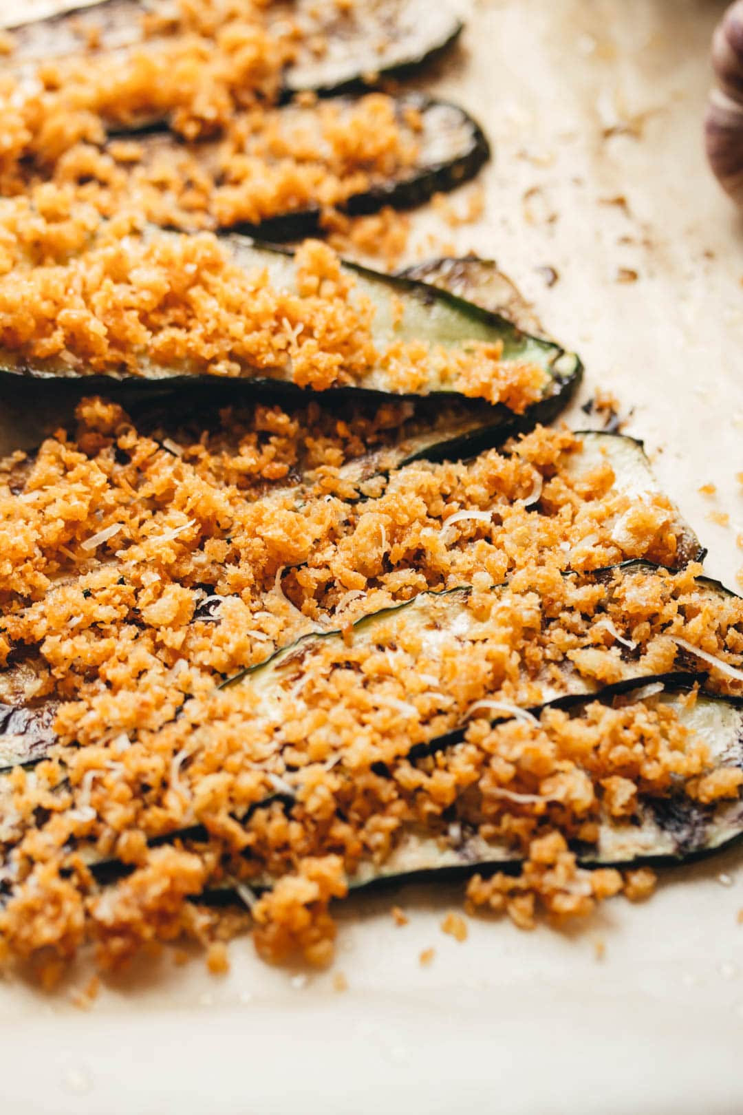 grilled summer squash planks topped with toasted parmesan breadcrumbs