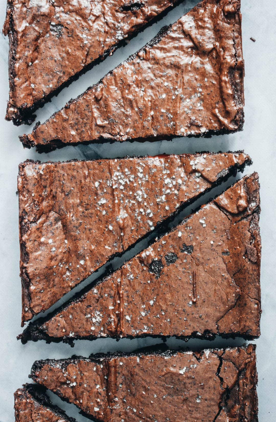 small-batch brownies cut into triangles sprinkled with salt